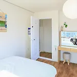 Sans Stay, Free Wine, Projector, 3Min Station